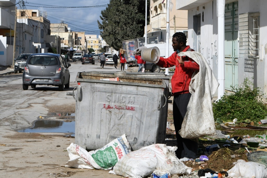 ‘I carry my cross’: sub-Saharan migrants despair in Tunisia