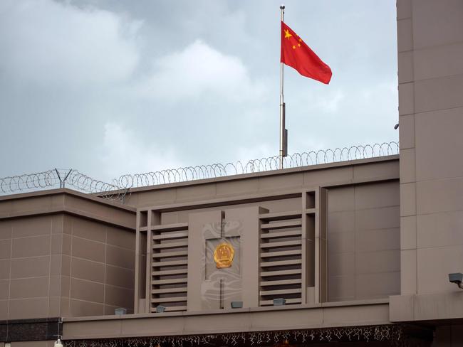 The Chinese flag flies at the Chinese consulate in Houston. Picture: AFP