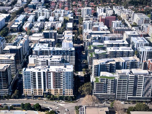A photo taken on June 16, 2024 shows an aerial view of newly constructed apartment blocks located in the Sydney suburb of Mascot. (Photo by DAVID GRAY / AFP)
