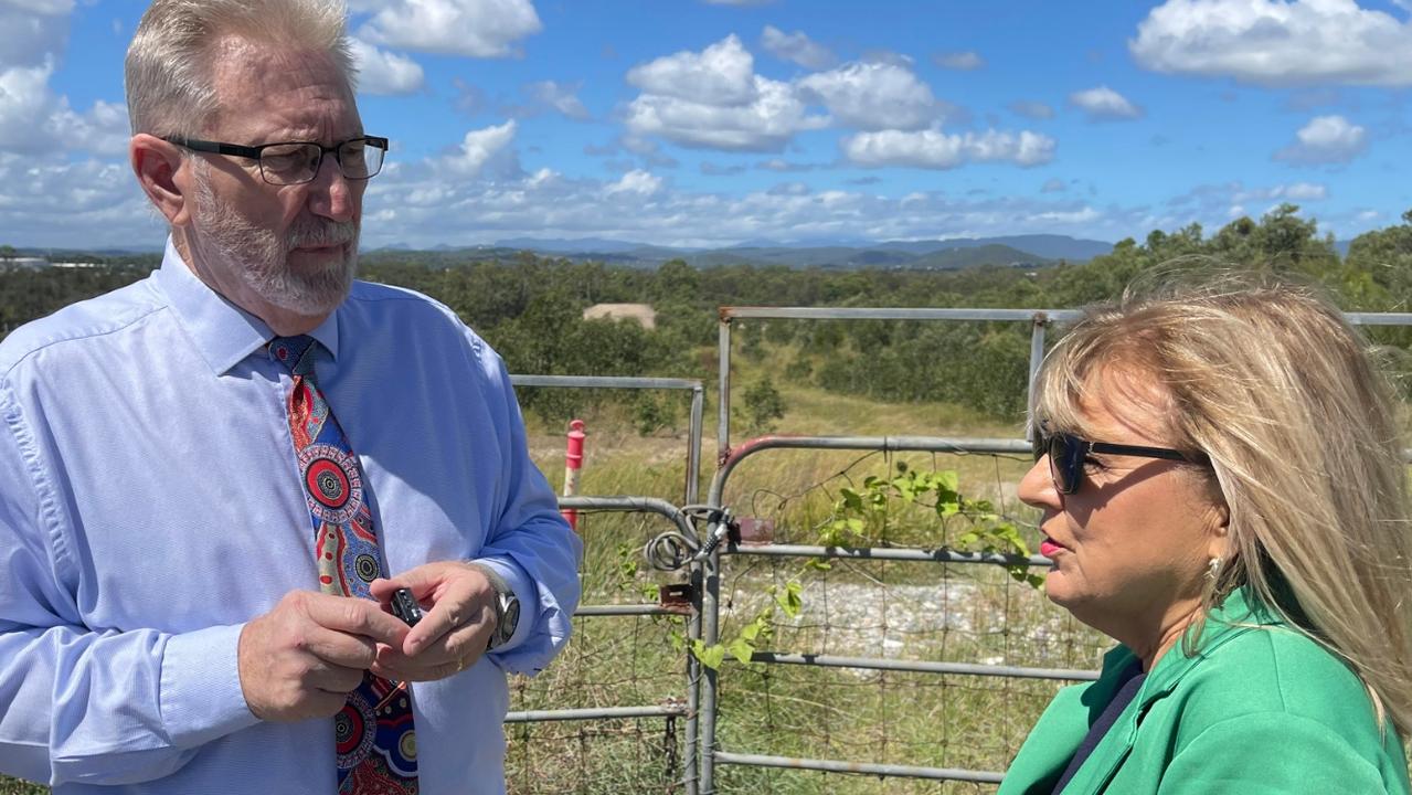 Coomera LNP MP Michael Crandon and Deputy Mayor Donna Gates discussing a petition calling for construction of next stages of the Coomera Connector.