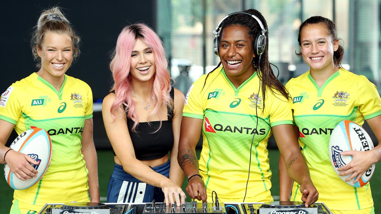 Australian sevens players with DJ Tigerlily, who will be spinning tunes in Sydney.