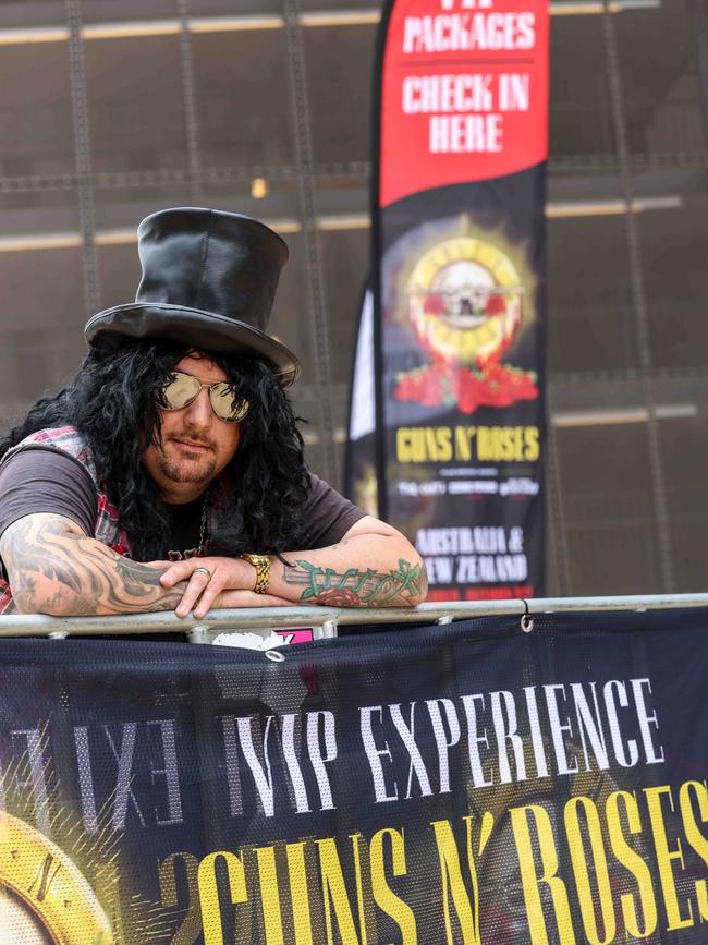 No, it’s not Slash – it’s Guns N’ Roses die hard fan Ash McInnes waiting in front of the VIP gates at Adelaide Oval. Picture: Russell Millard