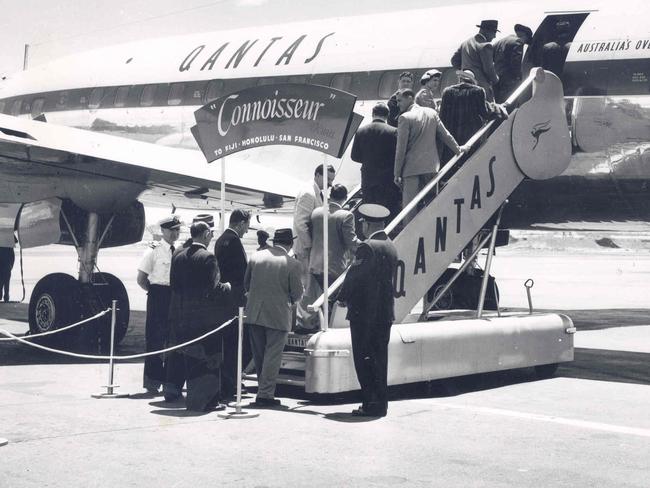 Passengers board a Qantas Lockheed Super Constellation in the 1950s. Picture: Supplied
