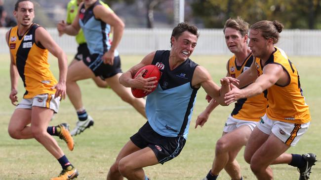 EDFL clubs Aberfeldie and Strathmore do battle last year. Picture: Mark Dadswell