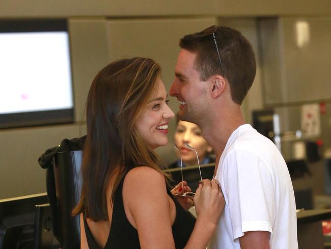 The happy couple pictured at LAX. Picture: Splash News.