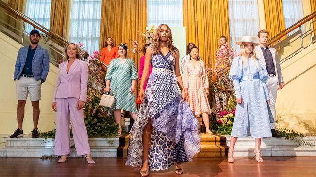 Model and Myer youth ambassador Sarsha Chisholm, centre, poses with other models at the Myer Mural Hall.