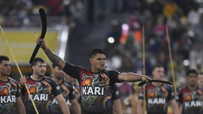 Latrell Mitchell leads the Indigenous 'War Cry'. Picture: Ian Hitchcock/Getty