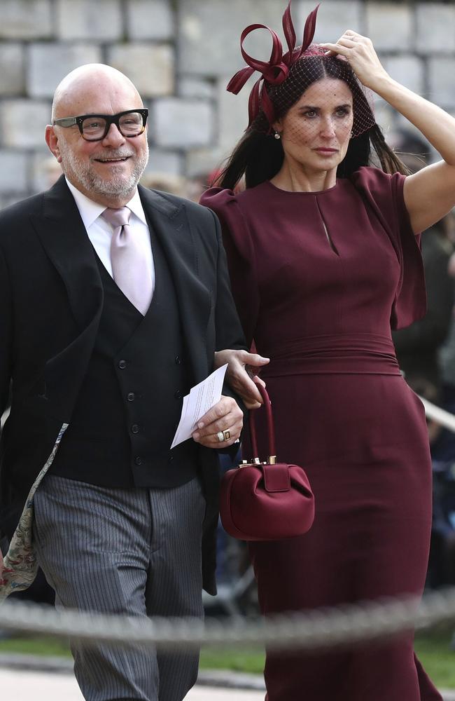 Demi Moore arrives ahead of the wedding of Princess Eugenie of York and Jack Brooksbank at St George’s Chapel, Windsor Castle, near London, England, Friday Oct. 12, 2018. (Gareth Fuller/Pool via AP)