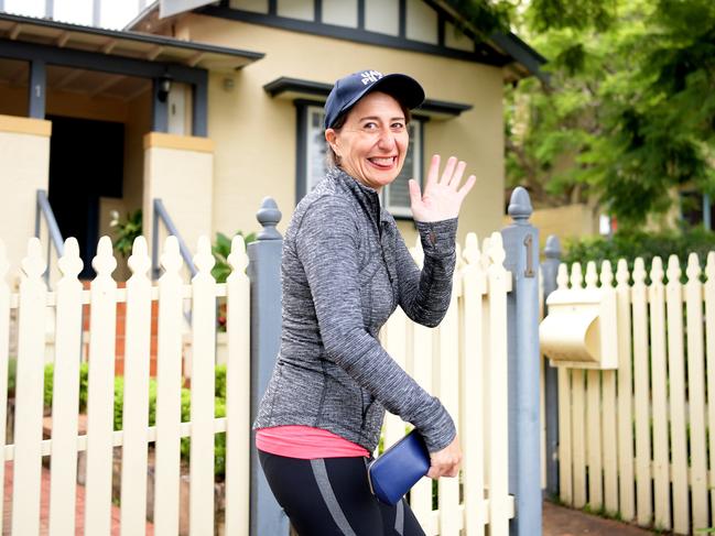 24/3/2019 Newly re elected NSW Premier Gladys Berejiklian pics up some flowers delivered by local Liberal Party member Max Menzies and walks to the local gym for a workout the morning after the NSW state election in Sydney. Tracey Nearmy/Daily Telegraph