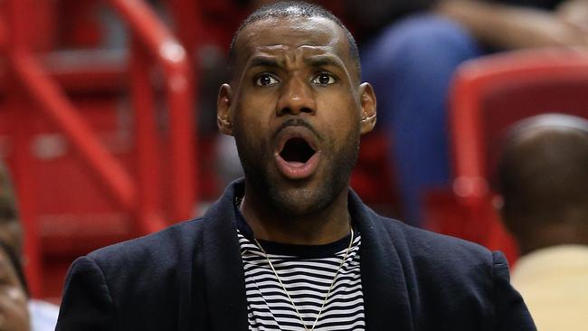 MIAMI, FL - DECEMBER 05: LeBron James #23 of the Cleveland Cavaliers looks on during a game against the Miami Heat at American Airlines Arena on December 5, 2015 in Miami, Florida. NOTE TO USER: User expressly acknowledges and agrees that, by downloading and/or using this photograph, user is consenting to the terms and conditions of the Getty Images License Agreement. Chris Trotman/Getty Images/AFP == FOR NEWSPAPERS, INTERNET, TELCOS & TELEVISION USE ONLY ==