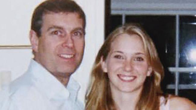 An undated handout photo taken at an undisclosed location and released on August 9, 2021 by the United States District Couty for the Southern District of New York shows (L-R) Prince Andrew, Virginia Giuffre, and Ghislaine Maxwell posing for a photo. - A US judge on January 12, 2022 denied Prince Andrew's plea to dismiss a sexual assault lawsuit brought against the British royal, paving the way for the case to proceed, a court filing showed. (Photo by Handout / US District Court - Southern District of New York (SDNY) / AFP) / RESTRICTED TO EDITORIAL USE - MANDATORY CREDIT "AFP PHOTO / UNITED STATES DISTRICT COURT FOR THE SOUTHERN DISTRICT OF NEW YORK" - NO MARKETING - NO ADVERTISING CAMPAIGNS - DISTRIBUTED AS A SERVICE TO CLIENTS