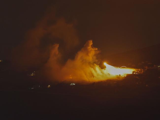 A picture taken from northern Israel, along the border with southern Lebanon, on September 30, 2024 shows a fire following Israeli bombardment on an area of south Lebanon. A Lebanese security official said Israel had conducted at least six strikes on south Beirut in the night from Monday to Tuesday, after Israel's army called on residents in the Hezbollah stronghold to evacuate. (Photo by Jalaa MAREY / AFP)