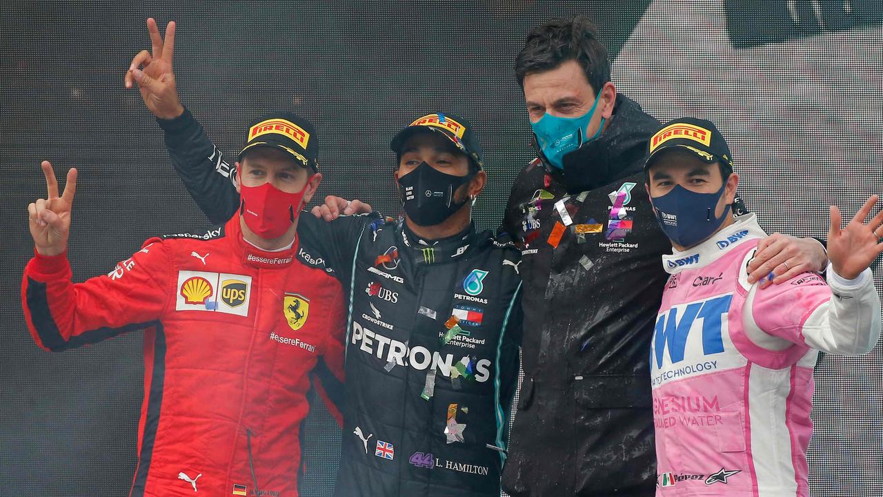 Ferrari's driver Sebastian Vettel (left), Mercedes' driver Lewis Hamilton, Team Principal Toto Wolff and Racing Point's driver Sergio Perez on the podium in Istanbul.