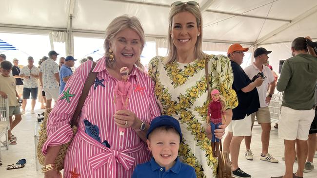 Jennifer Acton (left) with daughter Jessica and grandson Tommy as they prepare to cheer Hi Barbie in the Magic Millions in honour of the late Alan Acton. Picture: Ben Dorries