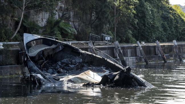 A motor cruiser has been destroyed at Woolwich Dock.