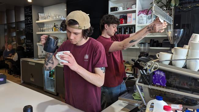 Inside Cafe Launceston is for sale. Pictured are baristas Josh Boutcher and Tom McLellan. The cafe's owners have revealed plans to open a new cafe inside the $27m St.Lukes Health head office development on Cimitiere St. Picture: Alex Treacy