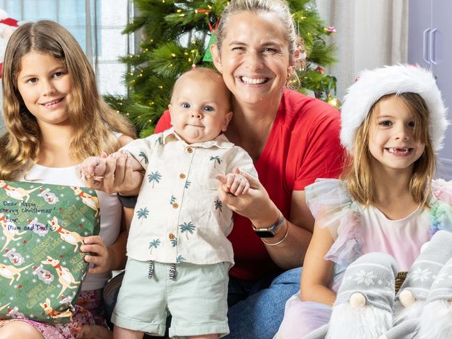 Libby Trickett at home with her children Poppy (age 8), Alfie (7 months) and Edwina (age 5), Tuesday, December 12, 2023 - Picture: Richard Walker