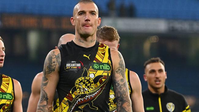 MELBOURNE, AUSTRALIA - MAY 25: Dustin Martin of the Tigers leads Tigers players from the MCG following the round 11 AFL match between Richmond Tigers and Essendon Bombers at Melbourne Cricket Ground, on May 25, 2024, in Melbourne, Australia. (Photo by Morgan Hancock/AFL Photos/via Getty Images)