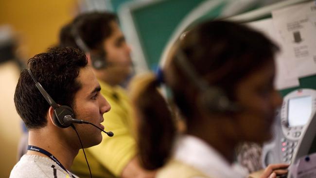 Indian staff working at a call centre in Gurgaon on the outskirts of New Delhi, 05/12/2008.