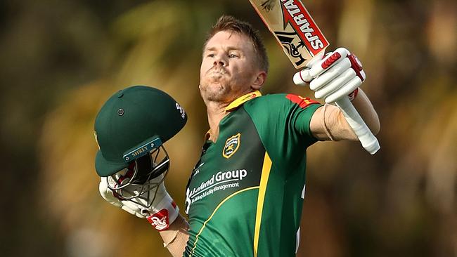 David Warner celebrates bringing up his century for Randwick Petersham in Sydney grade cricket last month. Picture: Getty Images