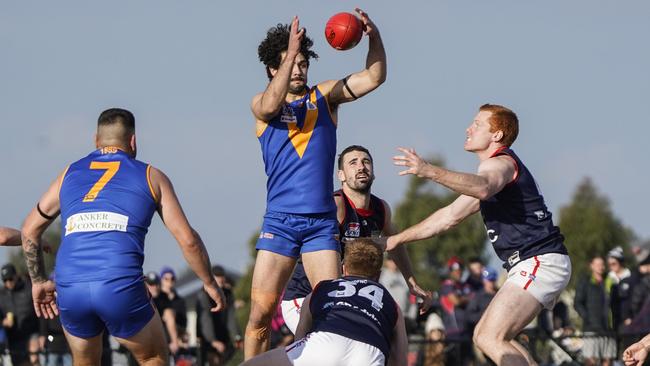 Kirk Dickson with the ball for Cranbourne. He’s a key inclusion for Rosebud in season 2024. Picture: Valeriu Campan