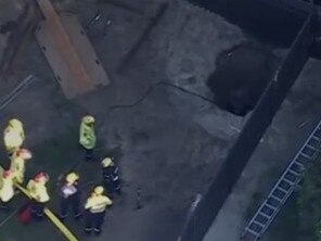 WA Fire and Rescue crews worked to rescue a man for a backyard hole in Hillarys, Perth, on June 25, 2024. Picture: 7News