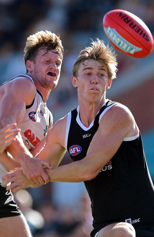 Tom Jonas and Todd Marshall tussle at Port Adelaide's first intra-club match at Alberton. Picture: Tom Huntley