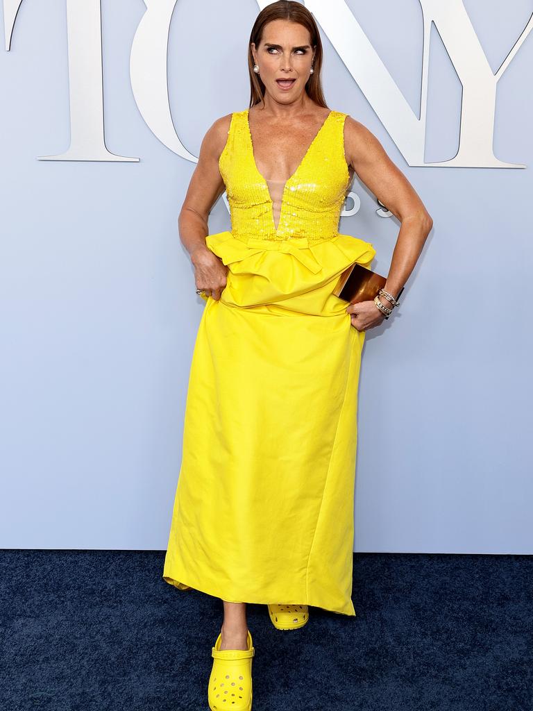 The actress lifted up her gown to reveal bright yellow crocs. Picture: Dimitrios Kambouris/Getty Images for Tony Awards Productions