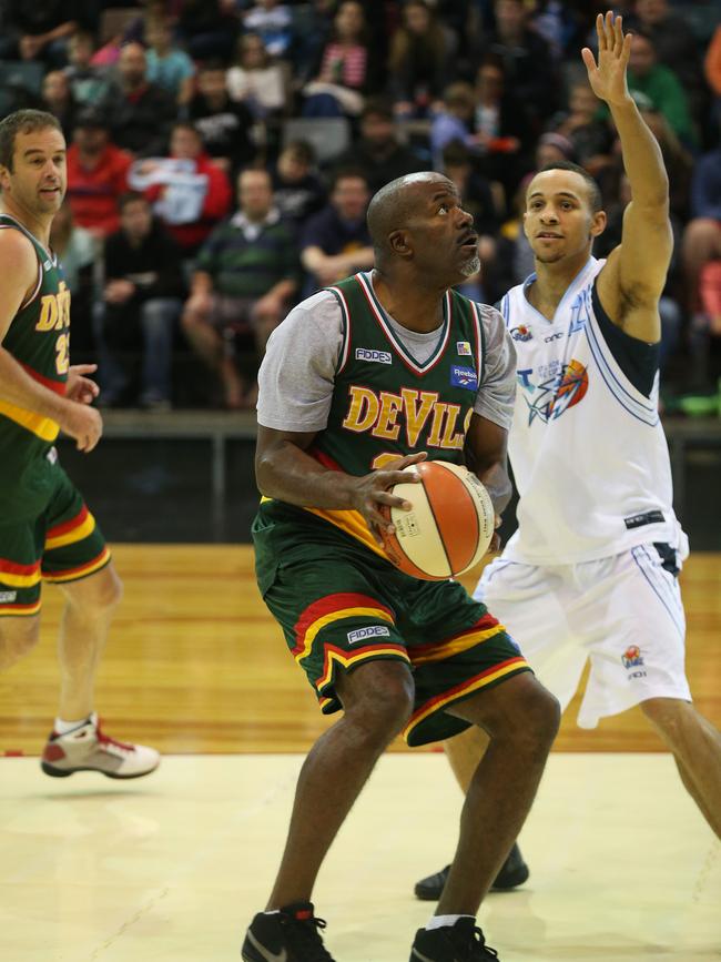 Sam McDaniel is the son of former Devils star import Wayne, pictured in action during an exhibition match at the Derwent Entertainment Centre several years ago.