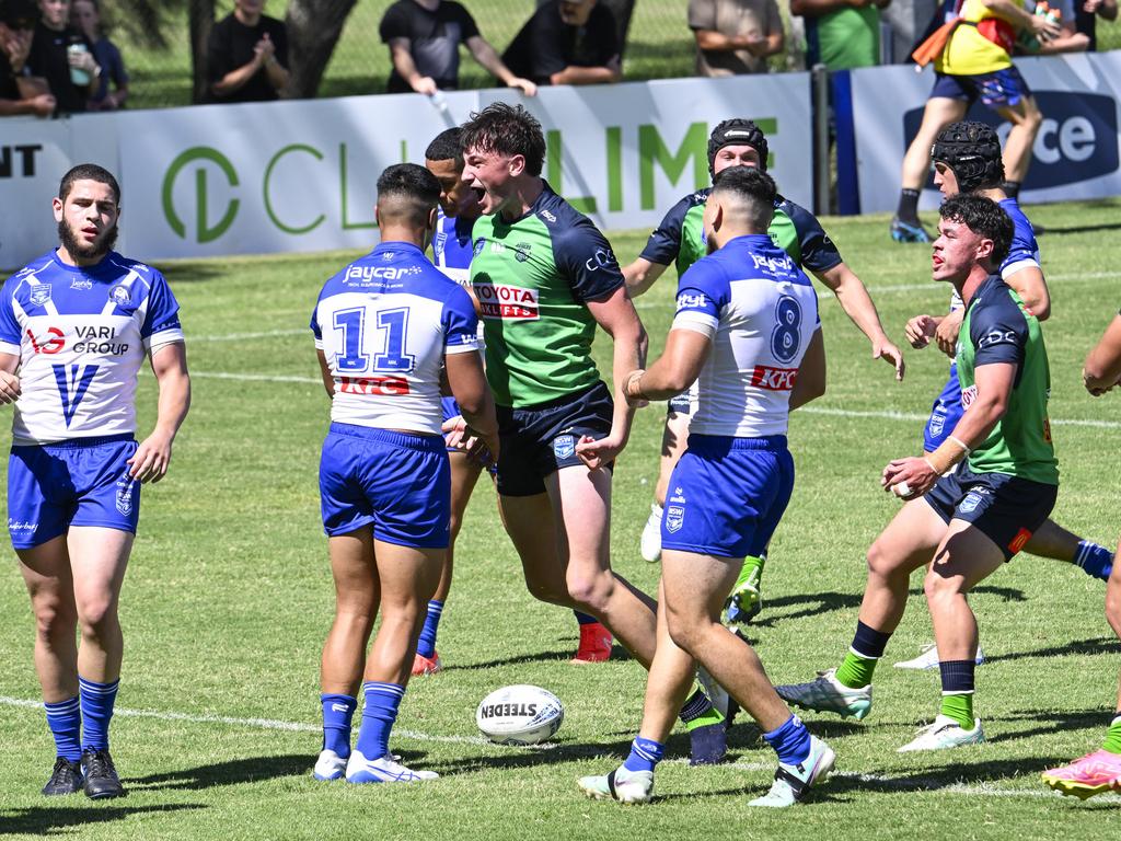 Jesse Milin celebrates a try. Picture: Martin Ollman