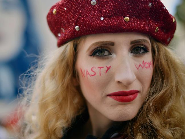 LOS ANGELES, CA - JANUARY 21: A participant marches during the Women's March on January 21, 2017 in Los Angeles, California. Tens of thousands of people took to the streets of Downtown Los Angeles for the Women's March in protest after the inauguration of President Donald Trump. Women's Marches are being held in cities around the world. Chelsea Guglielmino/Getty Images/AFP == FOR NEWSPAPERS, INTERNET, TELCOS & TELEVISION USE ONLY ==