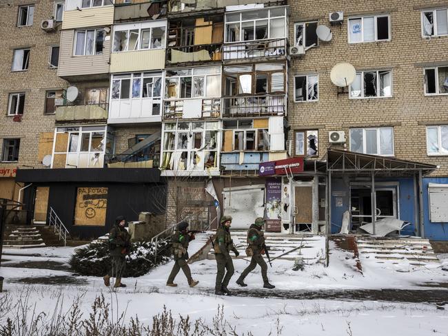 Ukrainian soldiers patrol in Bakhmut, Ukraine on February 14, 2023. Picture: John Moore/Getty Images.