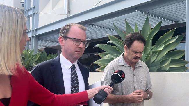 Mark Quentin Sargent (right) is questioned by media as he is leaving court in Southport with his lawyer Tom Gardiner. Picture: Jessica Paul