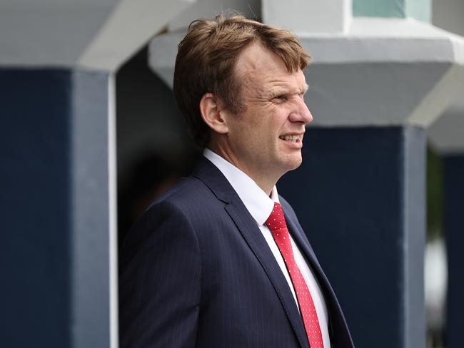 NEWCASTLE, AUSTRALIA - NOVEMBER 16: Trainer Bjorn Baker looks on prior to Race 1 NZB Airfreight Max Lees Classic during The Hunter Race Day at Newcastle Racecourse on November 16, 2024 in Newcastle, Australia. (Photo by Jeremy Ng/Getty Images)