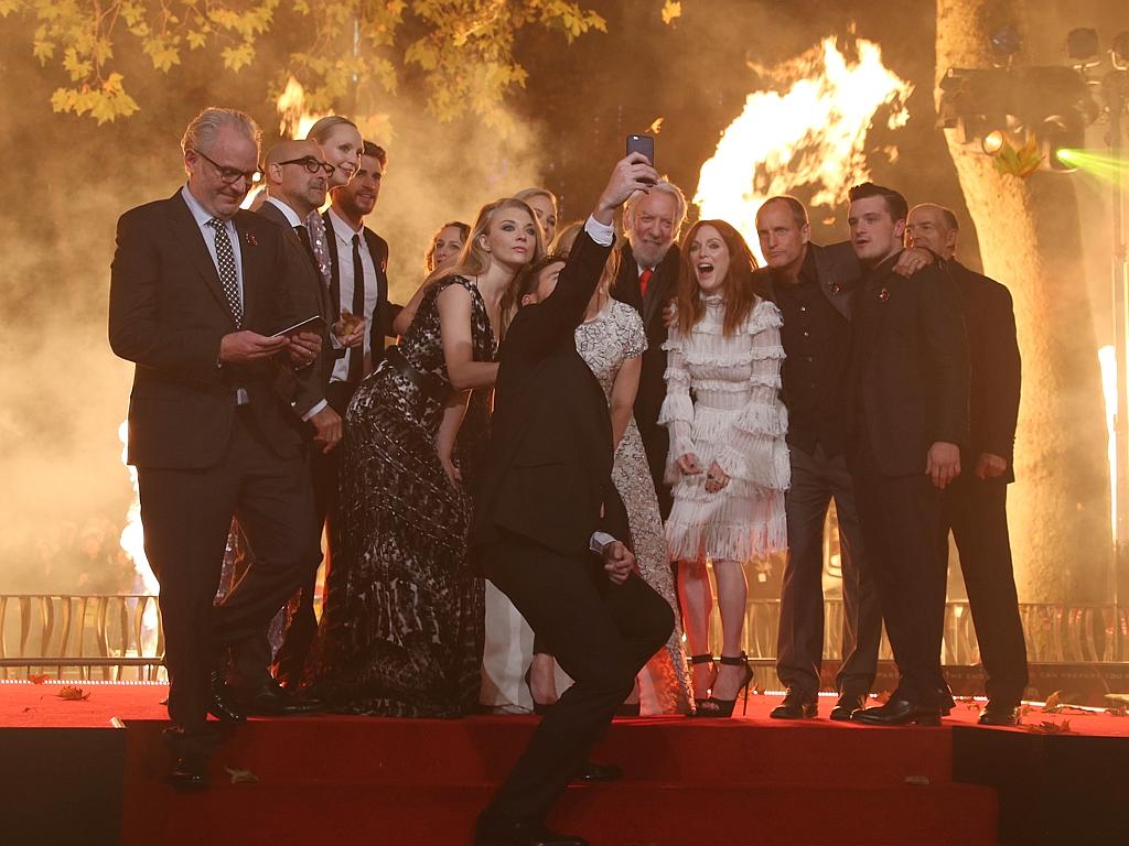 The cast and crew pose for a selfie at “The Hunger Games: Mockingjay Part 2” UK Premiere at the Odeon Leicester Square on November 5, 2015 in London. Picture: AP