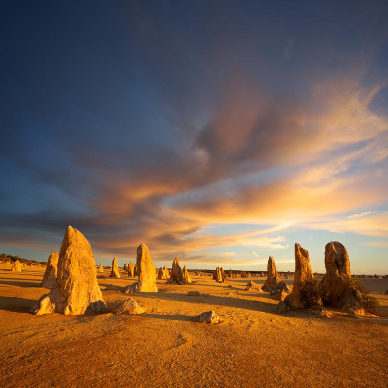 These limestone pinnacles were formed when the wind scoured sand from the land 30,000 years ago. Thousands punctuate the desert 200km north of Perth. Visits timed for the wildflower bloom from August to October will witness new life rising from the sand. Simon Bradfield/Getty Images