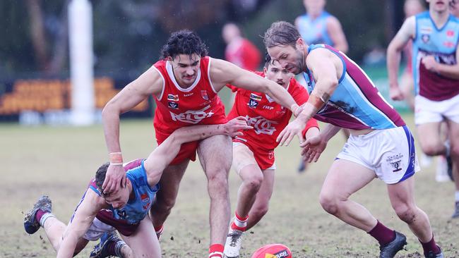 Ocean Grove's James Paterson (5) and Modewarre's Josh Finch (18). BFL: Ocean Grove v Modewarre senior football. Picture: Alan Barber