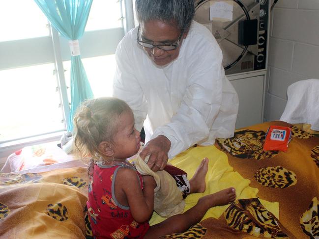 Medical staff attend to patients during a measles breakout in Samoa. Vaccination efforts in recent weeks have concentrated on children will now broaden to the wider population.