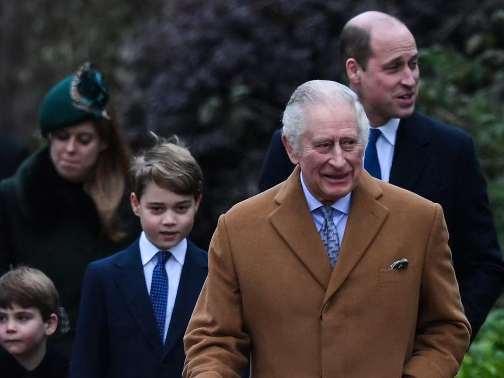 Prince Louis of Wales (L), Prince George of Wales (C) and Prince William, Prince of Wales (rear R) walk behind King Charles III (front R) as they arrive for the Royal Family's traditional Christmas Day service at St Mary Magdalene Church in Sandringham, Norfolk, eastern England. (Photo by Daniel LEAL / AFP)