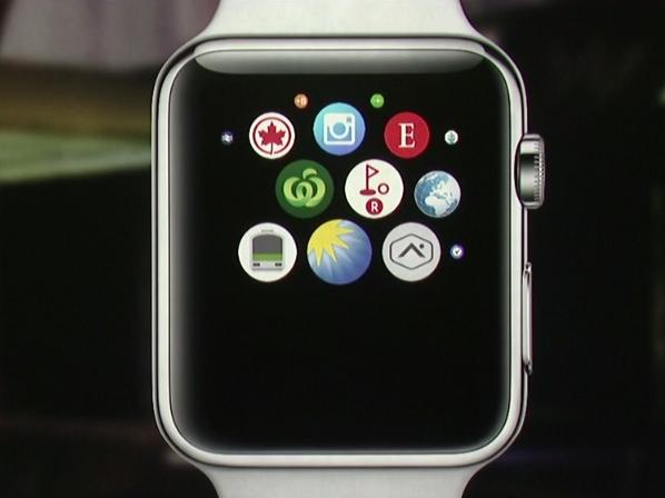 Apple vice president technology Kevin Lynch is portrayed next to an Apple Watch homescreen which includes a Woolworths app at the Apple Watch launch event in San Francisco.