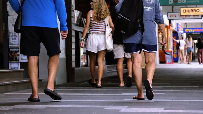 Unemployment in Cairns is lower now, than it was prior to Covid, contributing towards the region’s growing GDP, but also putting pressure on the city’s housing supply. Tourists enjoy the Esplanade Dining Precinct. Picture: Brendan Radke