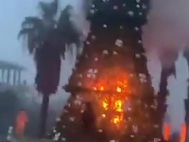 Protests follow the burning of a Christmas tree in Syrian town