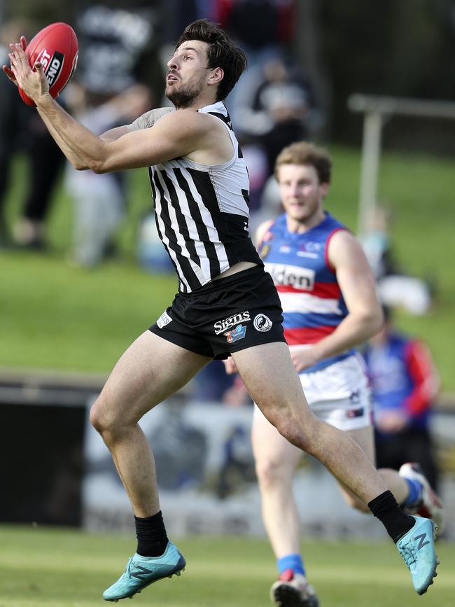 Port’s Sam Mayes marks the ball. Picture Sarah Reed