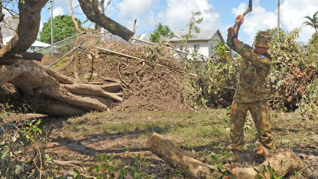Ten anniversary of Cyclone Yasi. Severe cyclone Yasi. Gunner Zac Redfern from Fourth Field Regiment helps clean up in Halifax. Picture: Evan Morgan