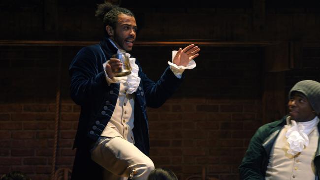 Daveed Diggs is Marquis de Lafayette and Okieriete Onaodowan is Hercules Mulligan in HAMILTON, the filmed version of the original Broadway production.