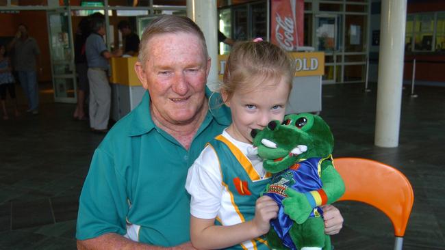 Ken Ufer with granddaughter Madison Ormay, 5 years at the Townsville Crocodiles v Dragons game held at the Swamp.