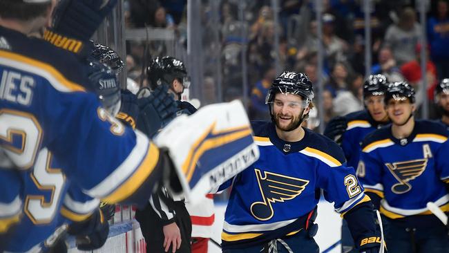 His teammates couldn’t be happier for him. Photo by Scott Rovak/NHLI via Getty Images