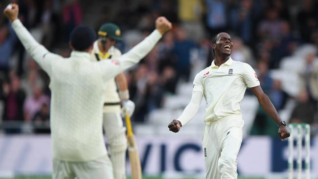 Man of the moment ... England paceman Jofra Archer (right) celebrates the wicket of Pat Cummins. Picture: Getty Images