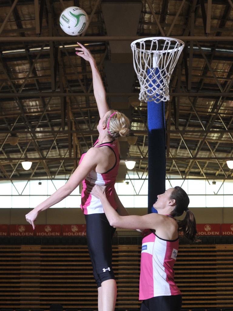 Bec Bulley “chairlifts” Kate Shimmin during a Thunderbirds training session.