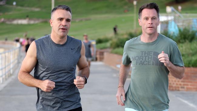 Chris Minns and Peter Malinauskas at Bondi Beach for a high-energy morning run. Picture: NCA NewsWire / Damian Shaw